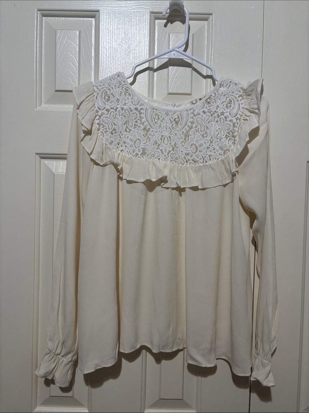 For love and lemons long sleeve  ruffle blouse Sz S 
P-P 19”